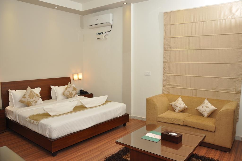Sukhmantra resort y Spa Candolim Habitación foto